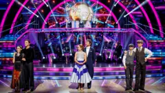 Finalists L-R Amber Davies and Nikita Kuzmin, George Clarke and Alexis Warr and Karen Carney and Carlos Gu, during the live show on BBC1's Strictly Come Dancing