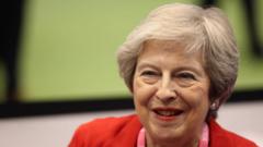 Theresa May and 'bionic' MP awarded peerages