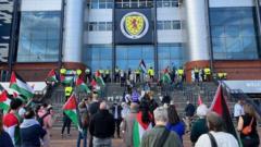 Protester chains himself to goalposts at  Scotland v Israel match
