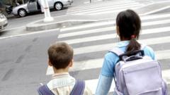 Children crossing the road