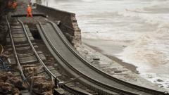 UK Storms Destroy Railway Line And Leave Thousands Without Power - BBC News