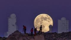 Supermoon appears over the Astro-Physical Institute of the Canaries in Tenerife