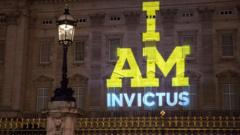 I AM INVICTUS projected onto Buckingham Palace