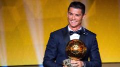 Cristiano Ronaldo beats Lionel Messi and Manuel Neuer to claim the 2014 Fifa Ballon d'Or at a ceremony in Zurich