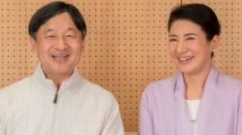 Japan's Crown Prince Naruhito and Crown Princess Masako smile at their residence, Togu Palace, in Tokyo