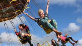 A woman on the flying chairs