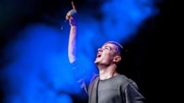 Dutch DJ Martin Garrix performs at the Heineken Music Hall after being revealed as the winner of the DJ Mag Top 100 DJs Poll 2016, during the Amsterdam Dance Event (ADE) in Amsterdam on October 19, 2016, becoming the youngest ever No.1 DJ