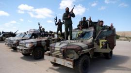 Libyan National Army (LNA) members, commanded by Khalifa Haftar, pose for a picture