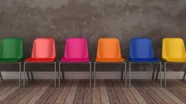 Row of colourful chairs
