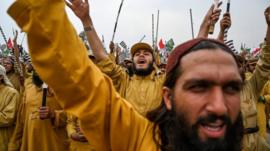 Activists and supporters of Islamic political party Jamiat Ulema-e-Islam (JUI-F) shout slogans during an anti-government "Azadi (Freedom) March" in Islamabad on November 1, 2019