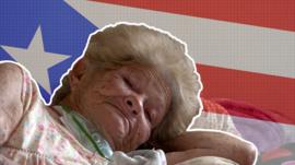 A stylized image of an elderly woman in bed with the Puerto Rican flag behind her