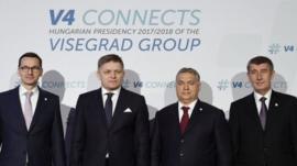Visegrad group leaders pose standing for press photographs