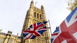 British flags fly outside the Houses of Parliament in London, 30 October 2019