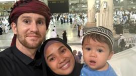 Dan with his wife and child in Mecca