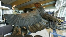 Eagle sculpture on airport floor
