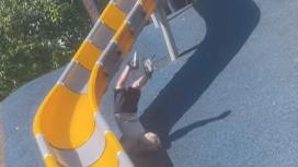 Boy falling from slide
