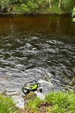 An electric bike in a river 