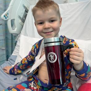 Harry in hospital with a Chelsea FC cup