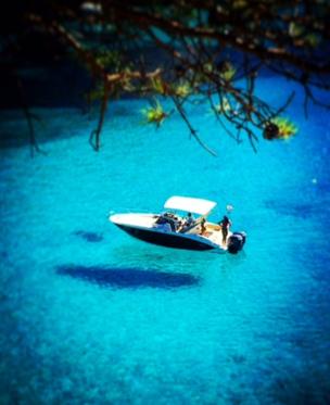 A boat on water in a lagoon