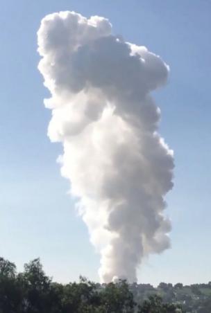 Smoke rises after fireworks blast in Tultepec, as seen from San Francisco Tenopalco, state of Mexico, Mexico July 5, 2018 in this picture grab obtained from social media video.