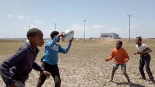Kids playing rugby in Zwide, Port Elizabeth