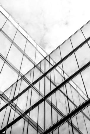 Reflections of buildings breathing a geometric pattern