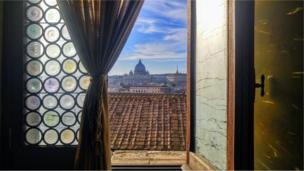 A view of the Vatican through a window