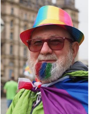 A man with a dyed beard