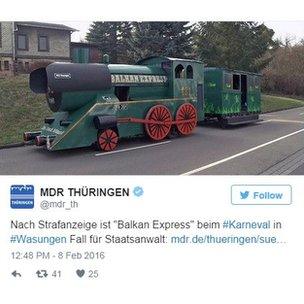 Tweet about a carnival float titled 'Balkan Express' at a parade in central Germany.