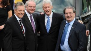 in_pictures Peter Robinson, Martin McGuinness, Bill Clinton and John Hume pictured in Londonderry in 2010 after the former US president visited Magee College