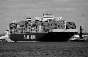 A cargo ship tightly packed and ready to go