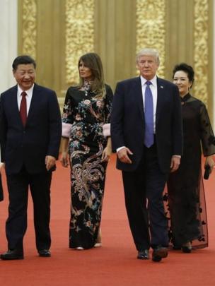 Donald Trump y Xi Jinping junto a sus respectivas esposas.