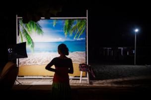 The silhouette of a woman against a backdrop