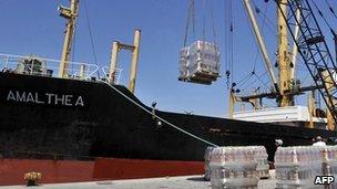 Crates of oil are loaded on to the Amalthea at the Lavrio port in Greece on 9 July, 2010