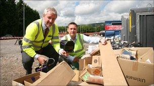 (Left-to-right) Kieran Madden, from SmartWater Technologies Ltd, and Torfaen council environmental officer Richard Marshall at a flytipping site