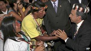 Ecuador's vice president Lenin Moreno shaking hands with indigenous representatives