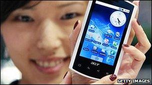 Taiwanese girl holding an Acer smart phone