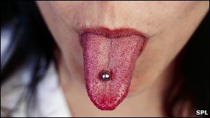 Woman with a tongue stud