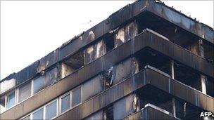 Woman charged over fire at block of flats in Kingston - BBC News