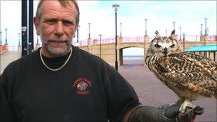 Mike Espley with one of the owls he uses to scare gulls