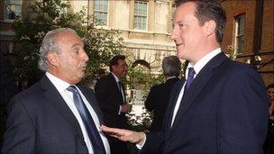 David Cameron talks to Sir Philip Green