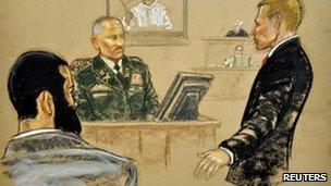 Omar Khadr (left) attends his trial in Guantanamo, 9 August (courtroom sketch does not identify other figures)