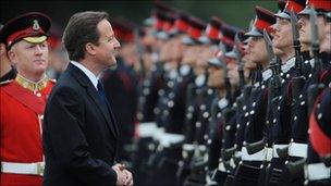 David Cameron inspects Officer Cadets during their passing out ceremony