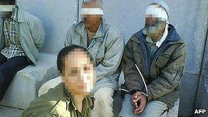 Eden Aberjil posing with Palestinian prisoners
