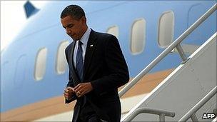 Barack Obama exits Air Force One