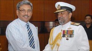 Gotabhaya Rajapaksa (left) with a navy commander
