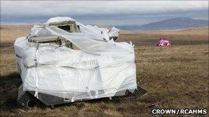 Bubble wrapped and pink APC at Cape Wrath. Image: Copyright Crown/RCAHMS