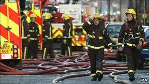 Firefighters at the scene of a fire in Peckham, south- east London
