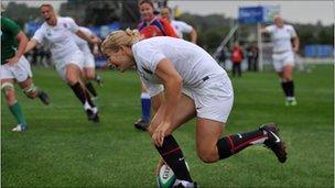 England's Fiona Pocock runs in to score a try against Ireland during the Women's World Cup