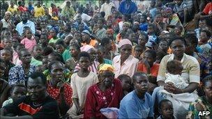Southern Sudanese wait for food, shelter, security and medicine at the village of Nzara, along Sudan's border with DR Congo